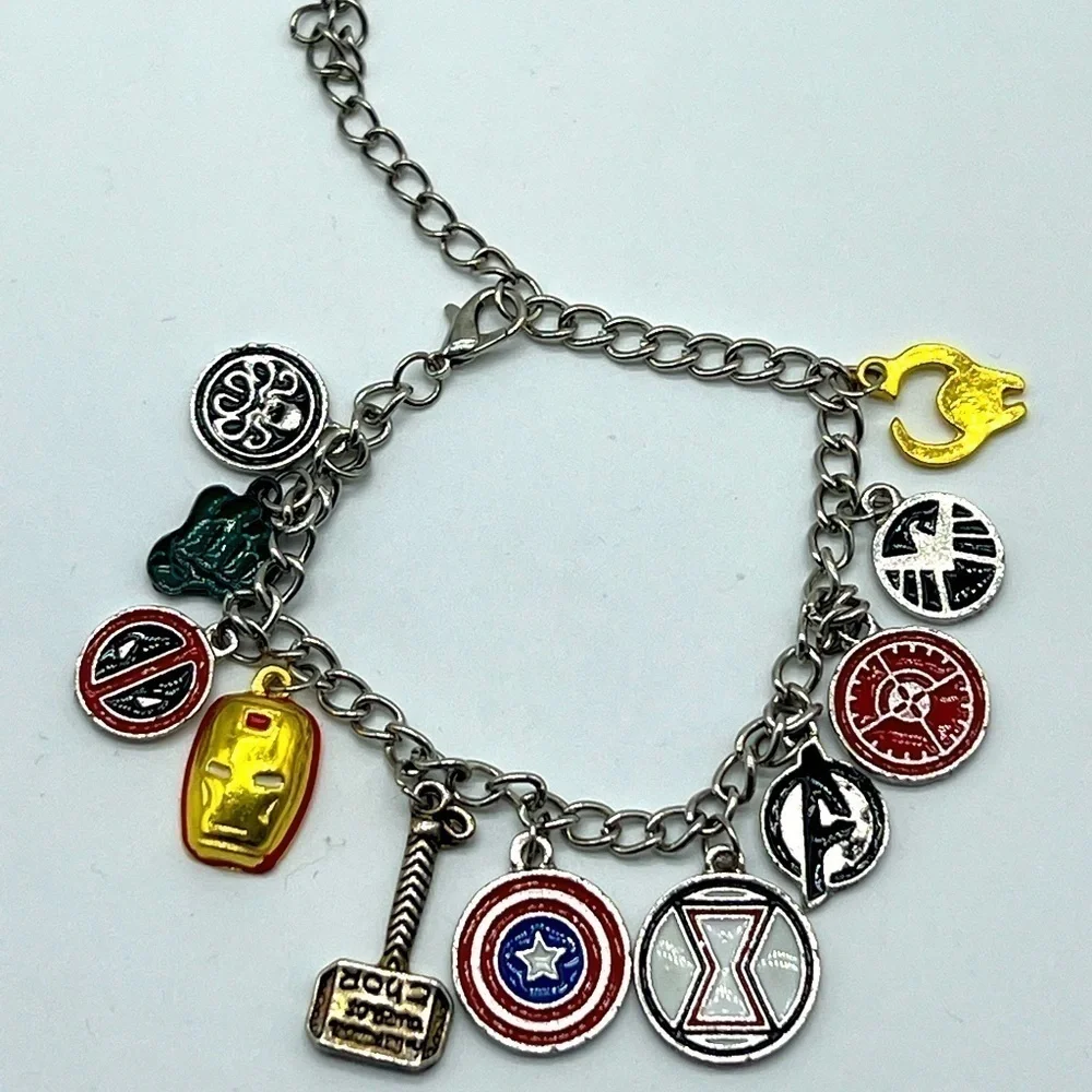 AVENGERS character charm bracelet featuring Thor’s hammer and other symbols